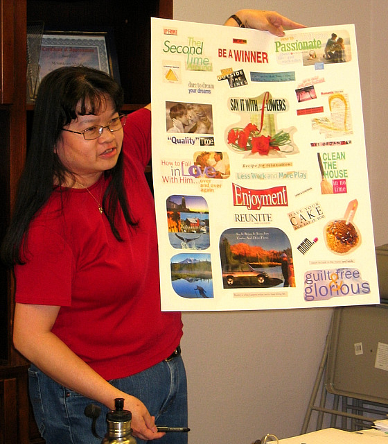 Participant displays life changing poster she made